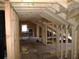 Knee walls are installed in the attic for roof support and can be used as small areas of storage